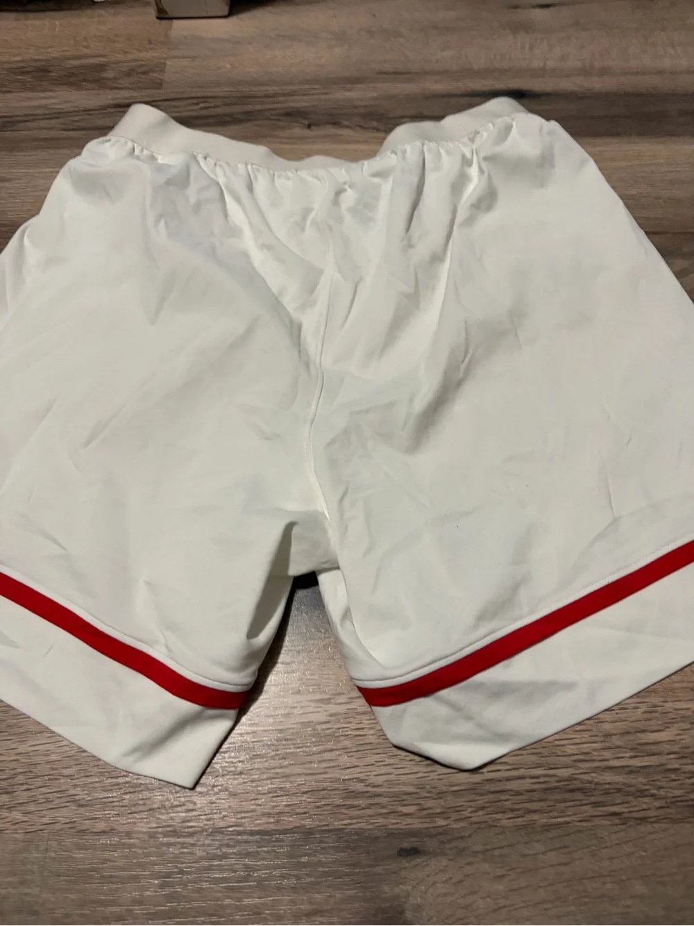 Under Armour White Men’s Athletic soccer Shorts with Red Logo Accents